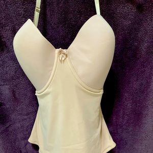 Long line strapless bustier with removable neck straps and stocking straps.